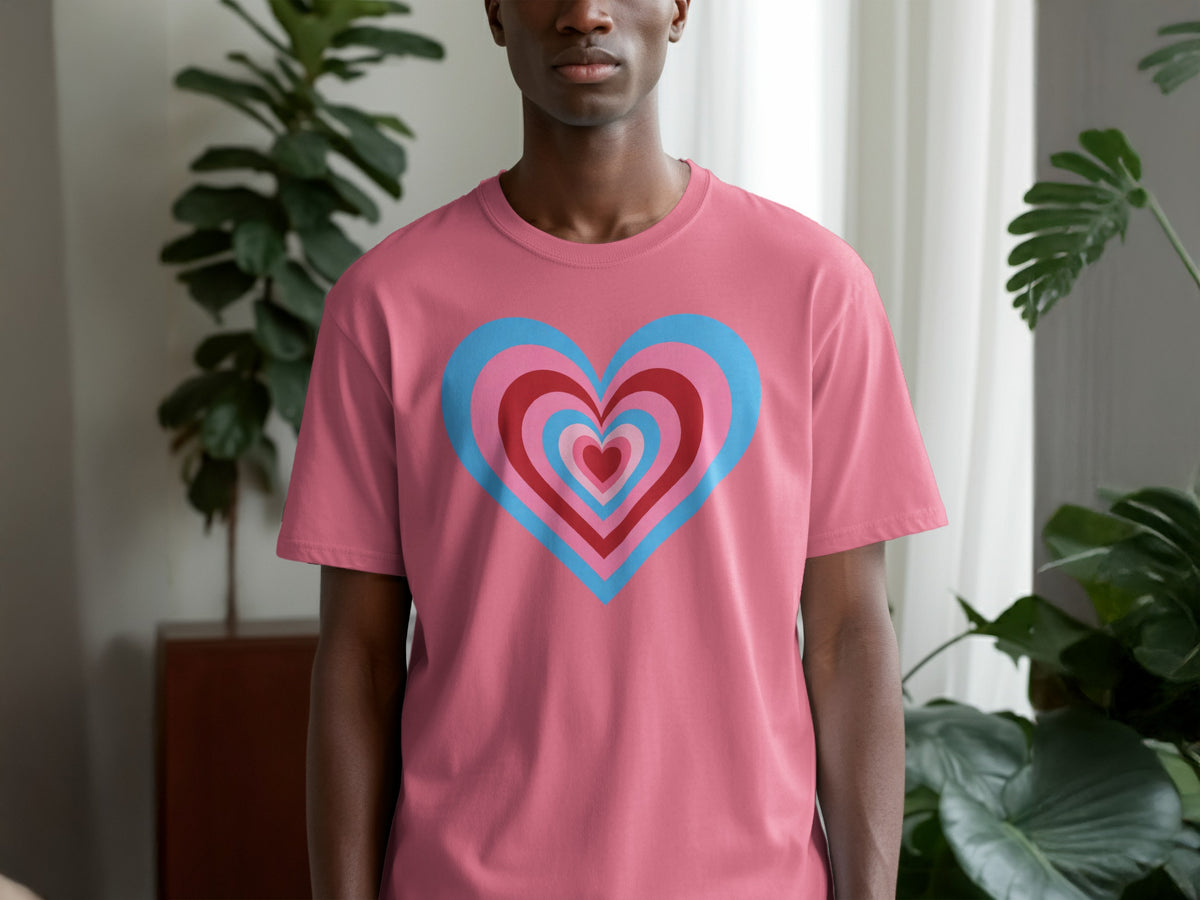 Pink t-shirt with a concentric heart design in red and light blue.
