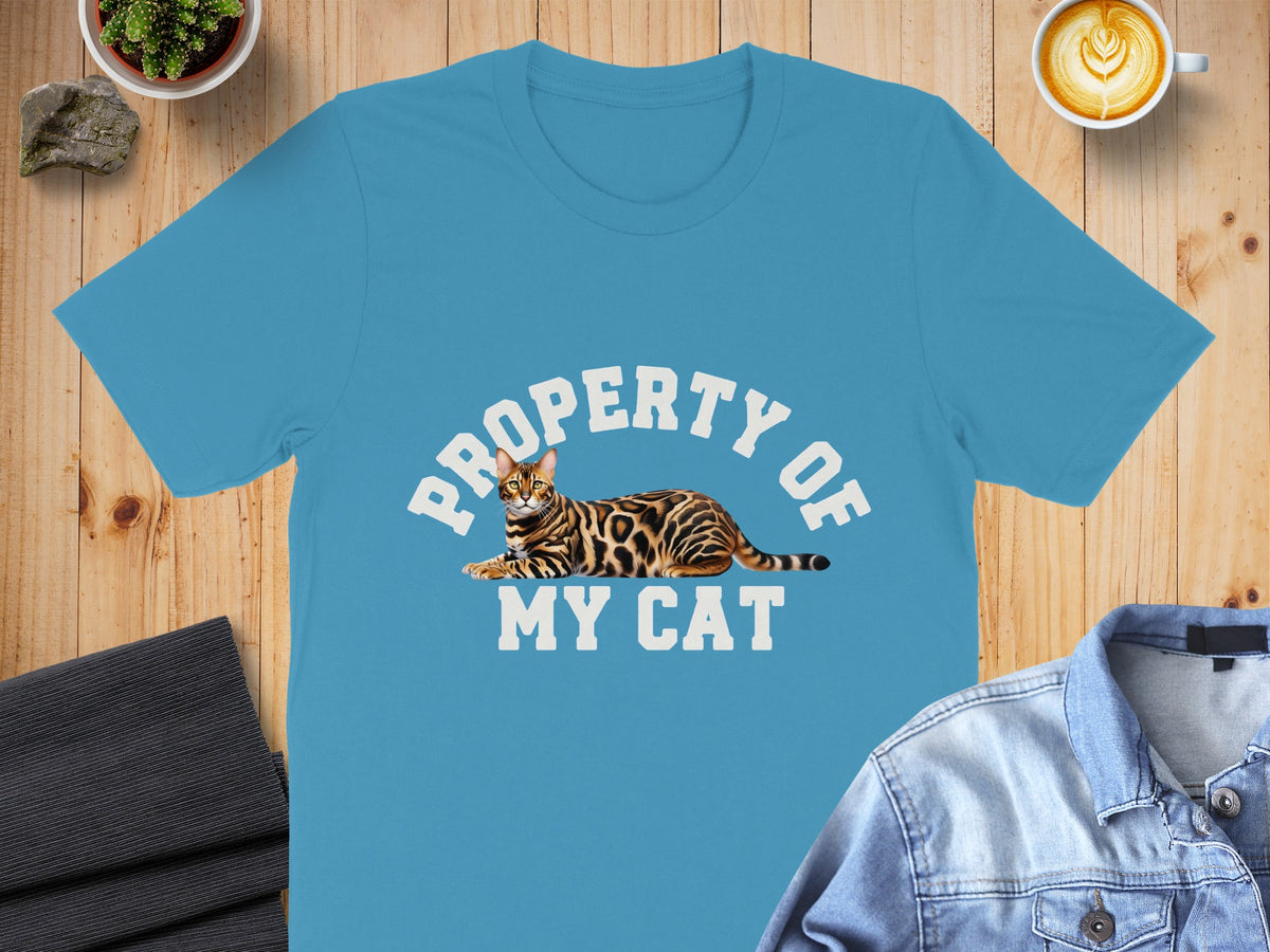 Blue t-shirt with "PROPERTY OF MY CAT" text and a Bengal cat graphic.