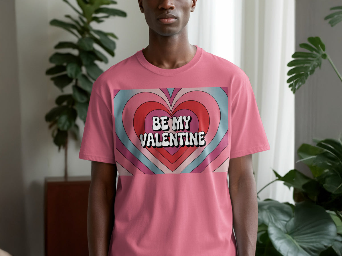 Pink t-shirt with a heart design and text "Be My Valentine".