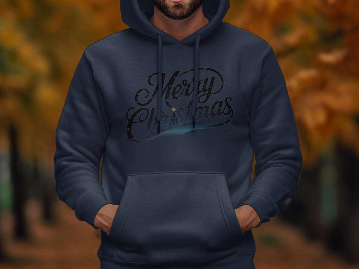 A man wears a dark blue hooded sweatshirt featuring a Merry Christmas graphic across the chest.