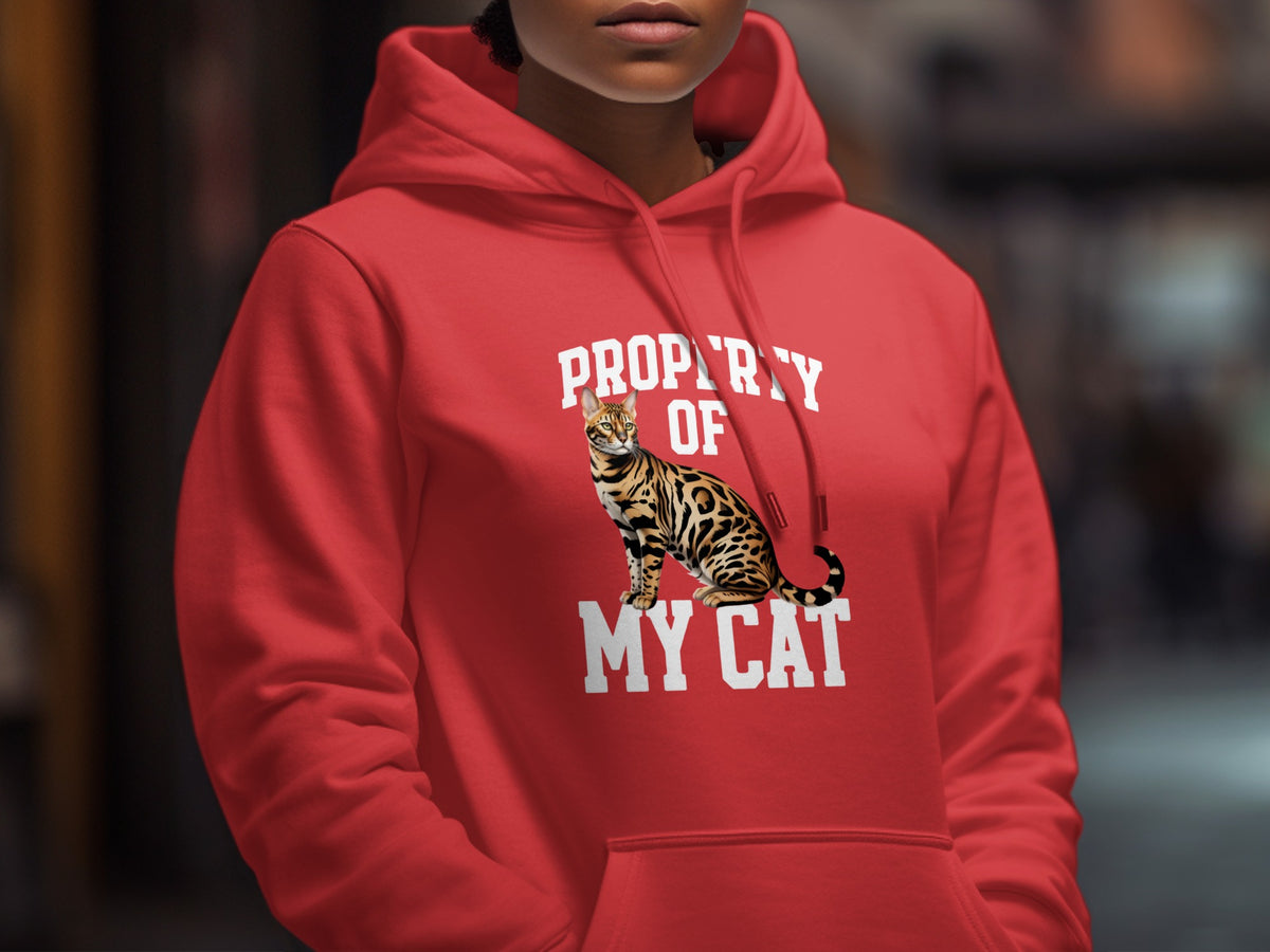 Red hoodie with white text "PROPERTY OF MY CAT" and a Bengal cat illustration.