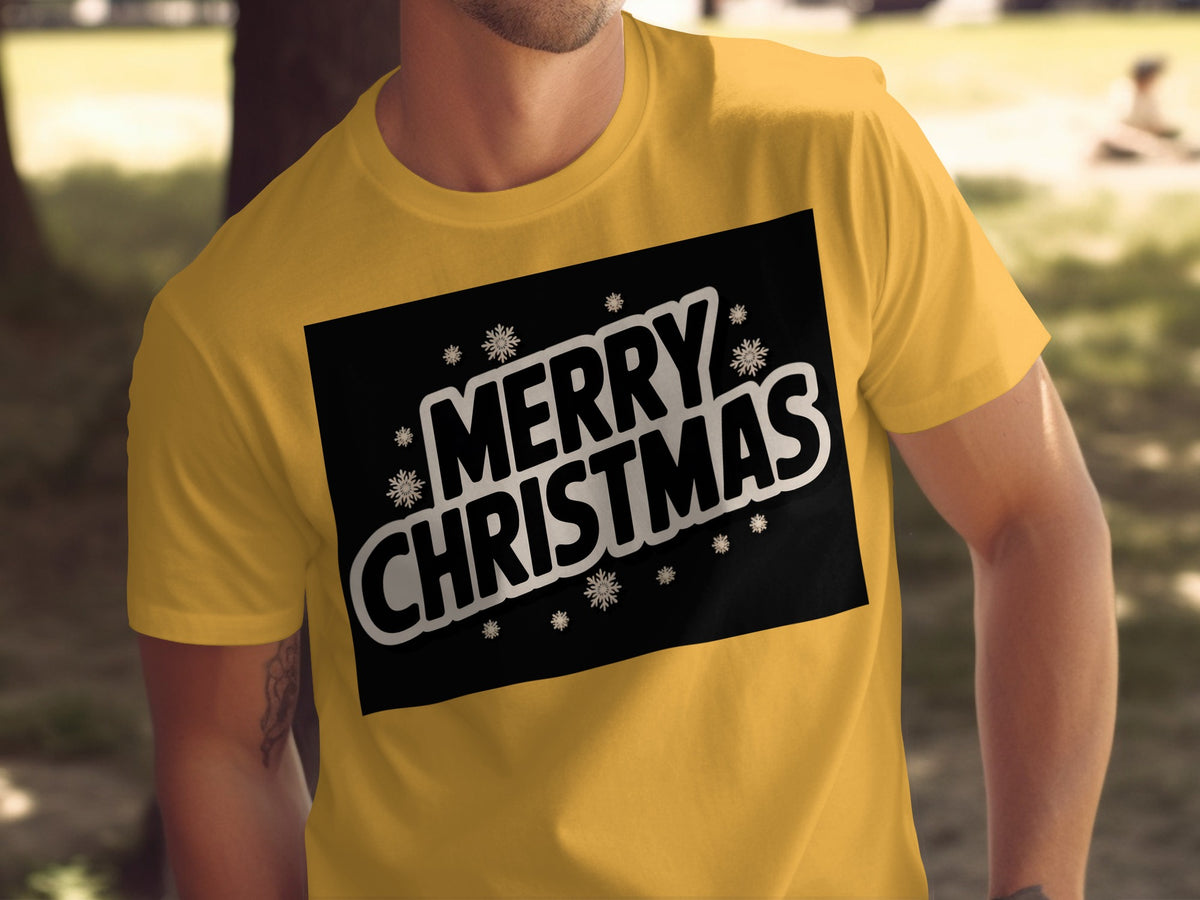 Yellow t-shirt with black graphic of "MERRY CHRISTMAS" and snowflakes.