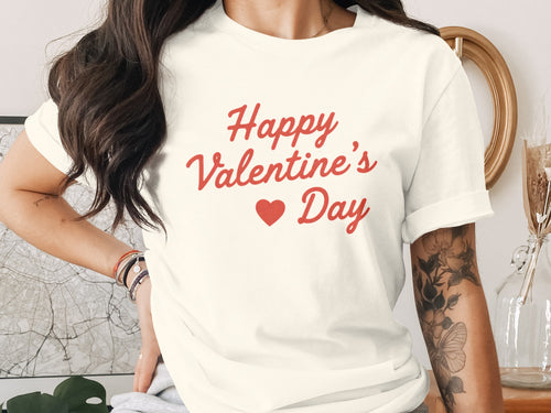Cream t-shirt with red "Happy Valentine's Day" text and a heart.