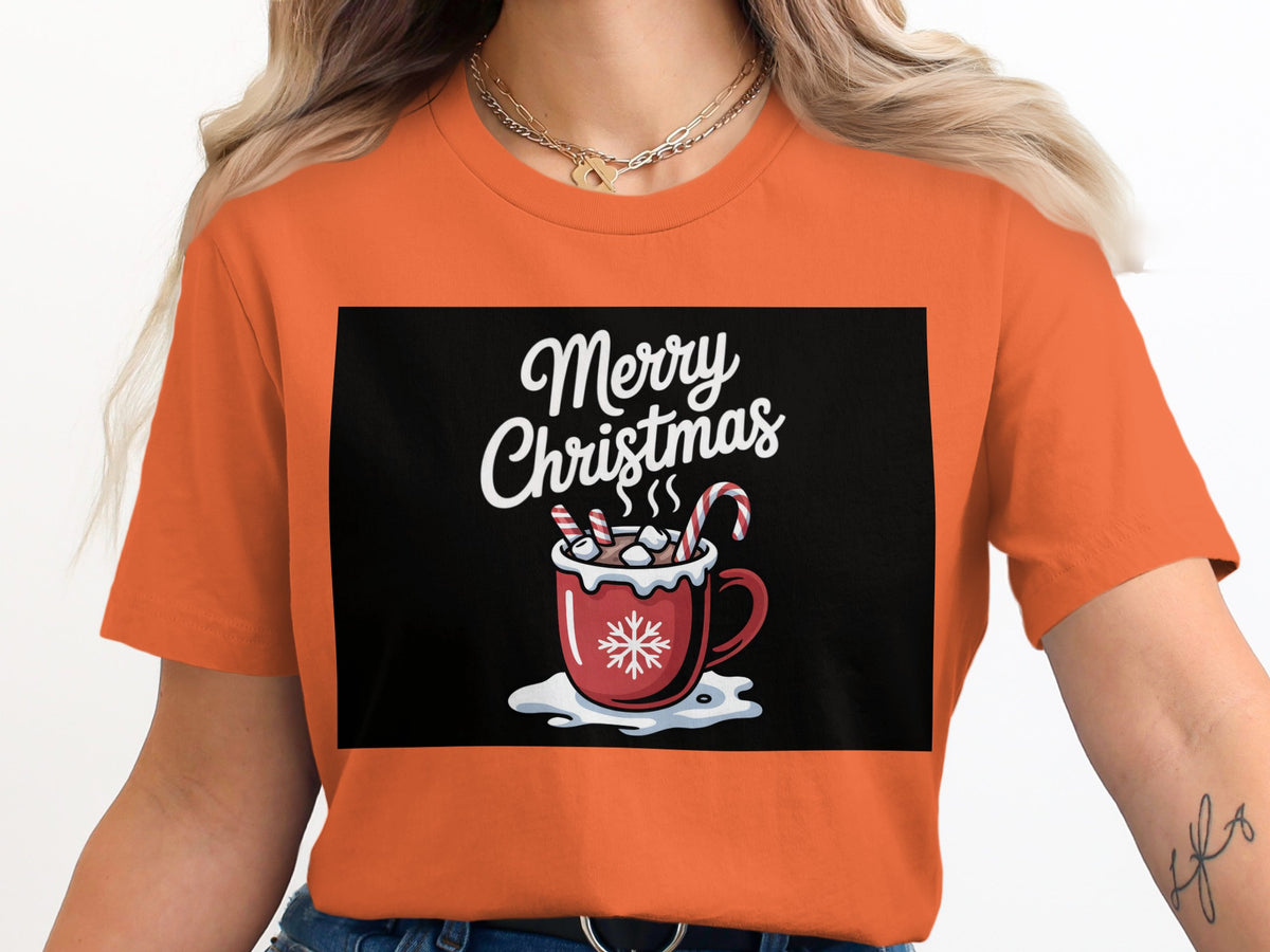 Orange t-shirt with "Merry Christmas" and hot cocoa graphic.