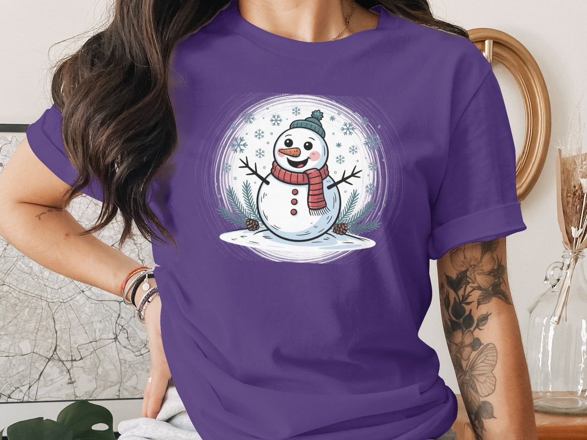 Purple t-shirt featuring a cartoon snowman with a scarf and hat.