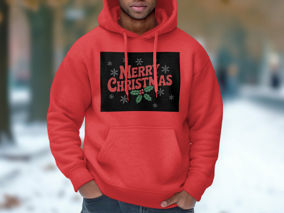 A person wearing a bright red hooded sweatshirt with a Merry Christmas graphic on the chest.