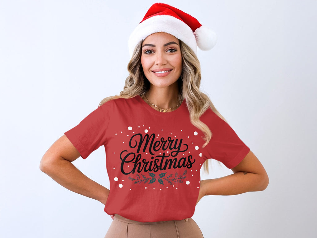 Red t-shirt with "Merry Christmas" text and holly design.