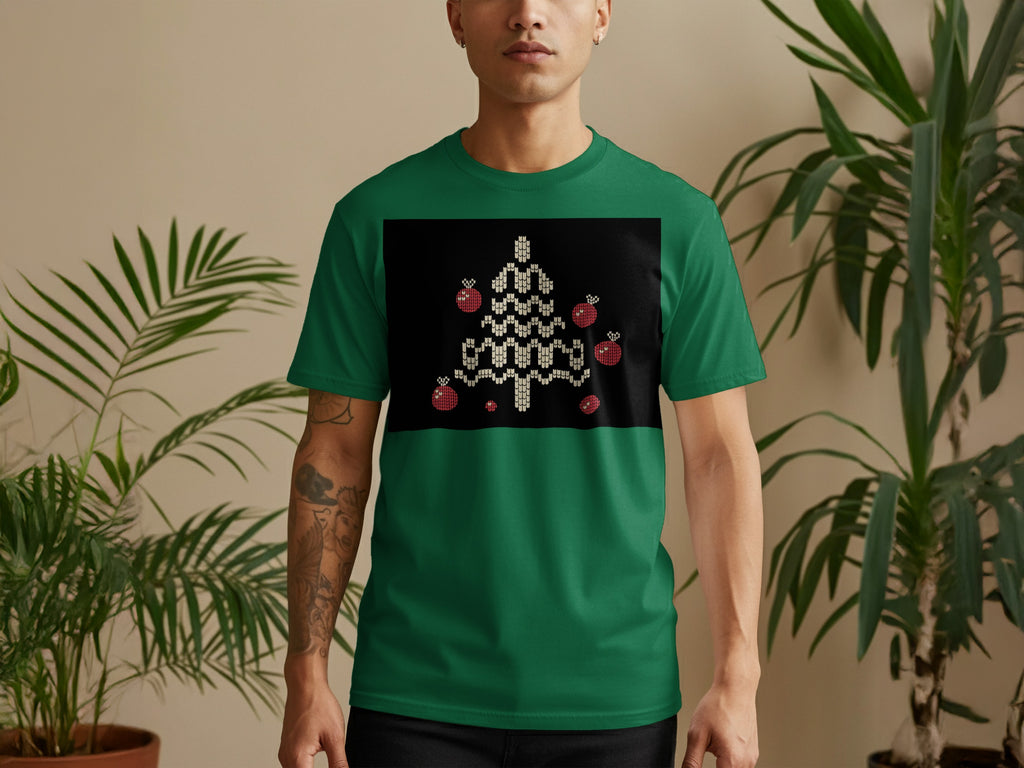 Green t-shirt with a pixelated Christmas tree and ornaments design on black fabric.