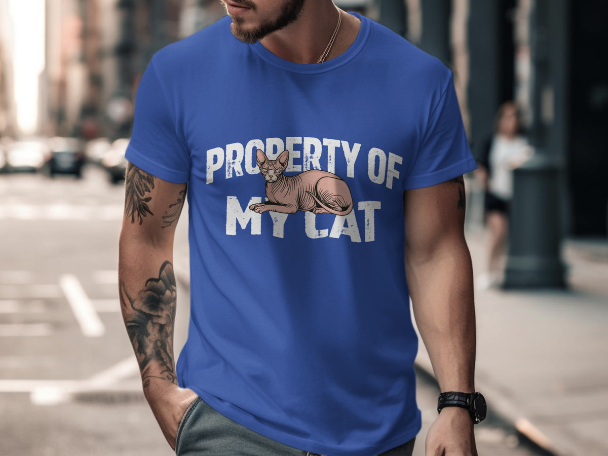 Blue t-shirt with "PROPERTY OF MY CAT" and a Sphynx cat graphic.