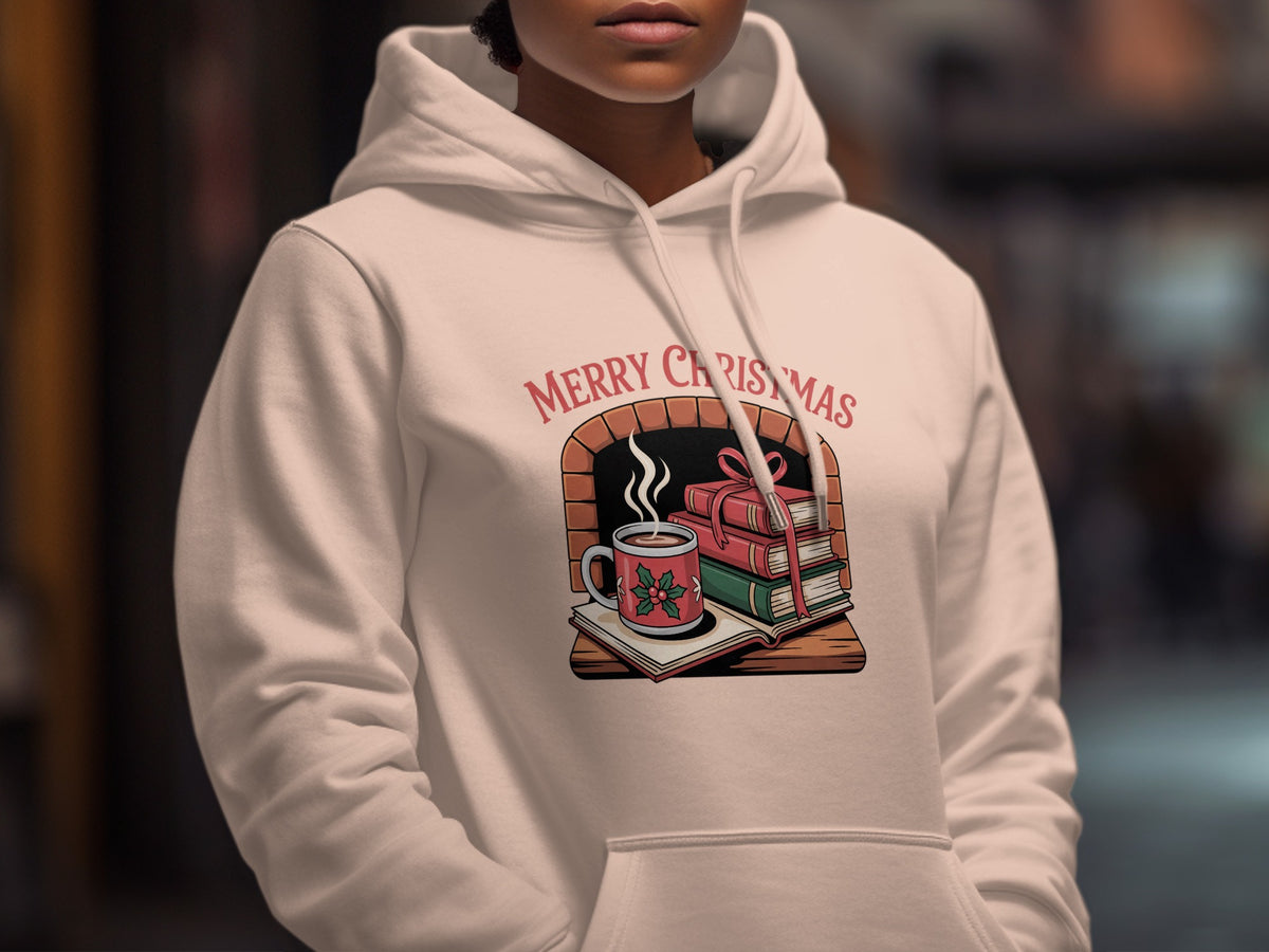 White hoodie with "Merry Christmas" text and fireplace scene with books.