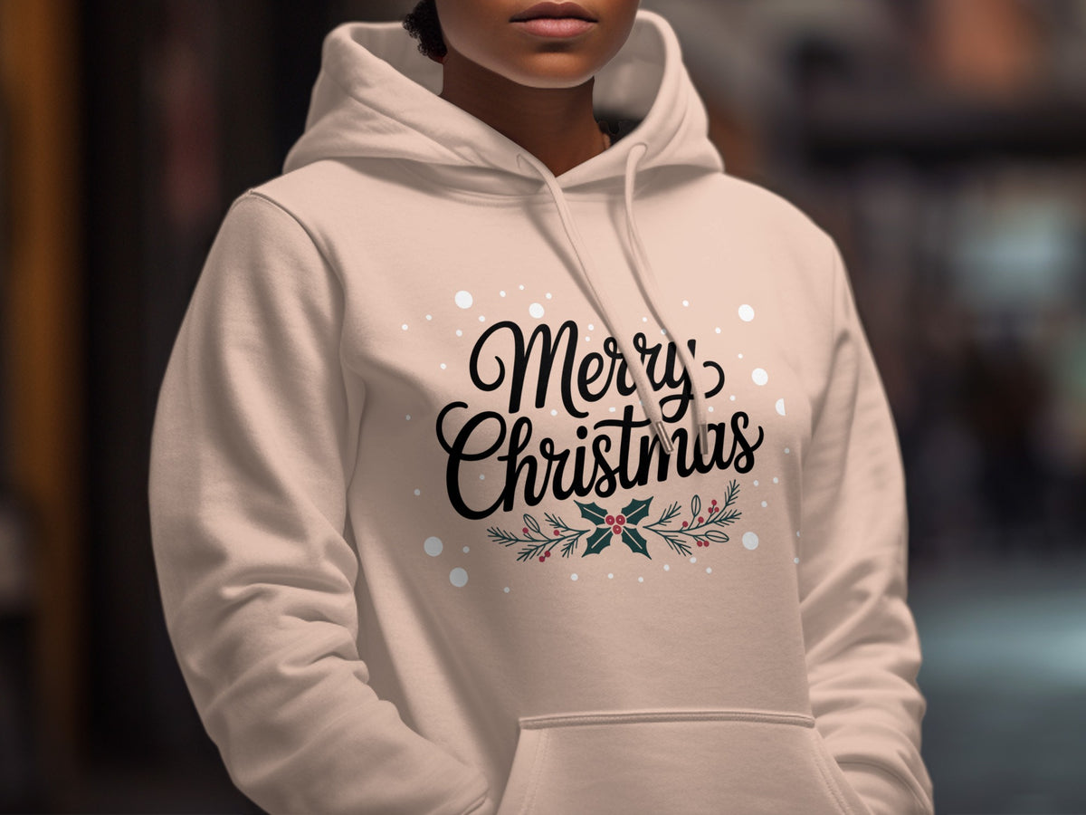Light peach hoodie with "Merry Christmas" and holly graphic.