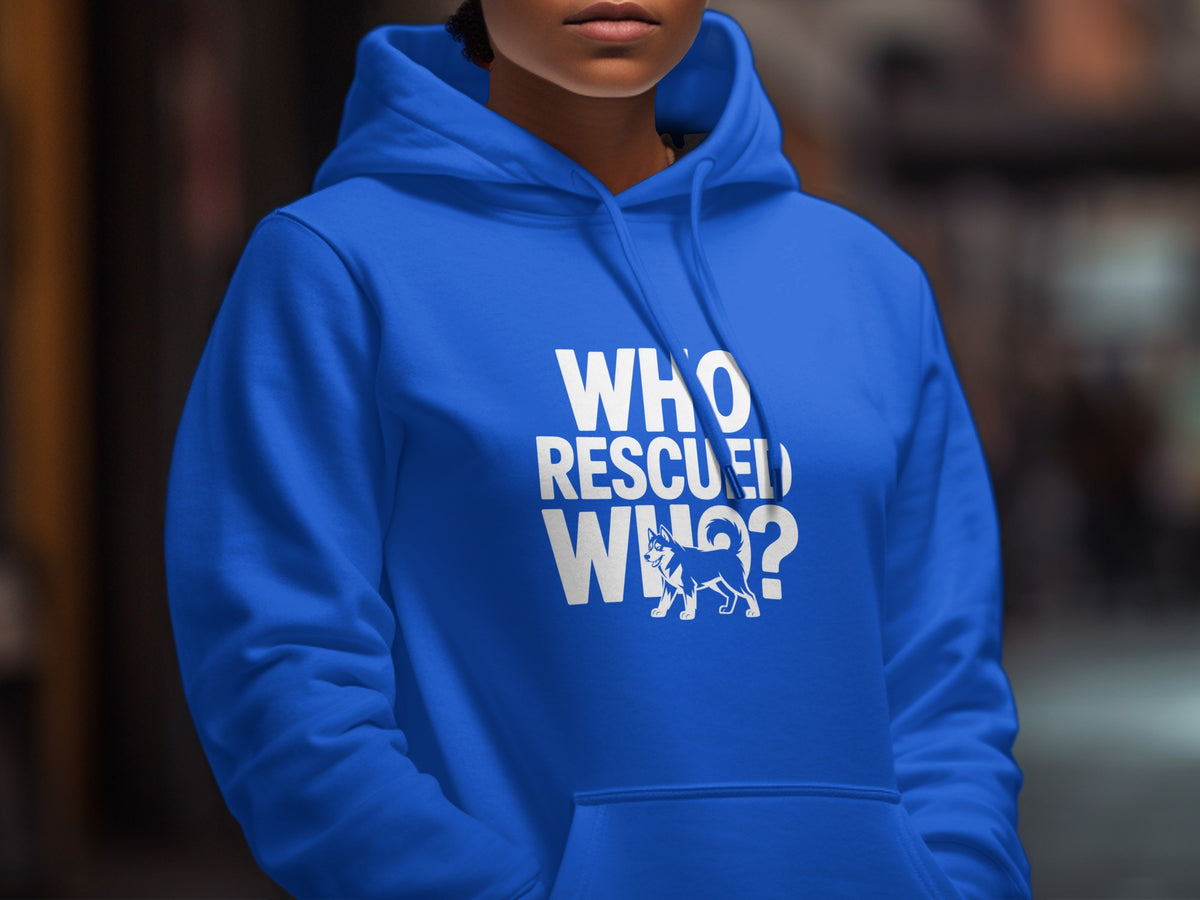 Blue hoodie with white text "WHO RESCUED WHO?" and a husky silhouette.