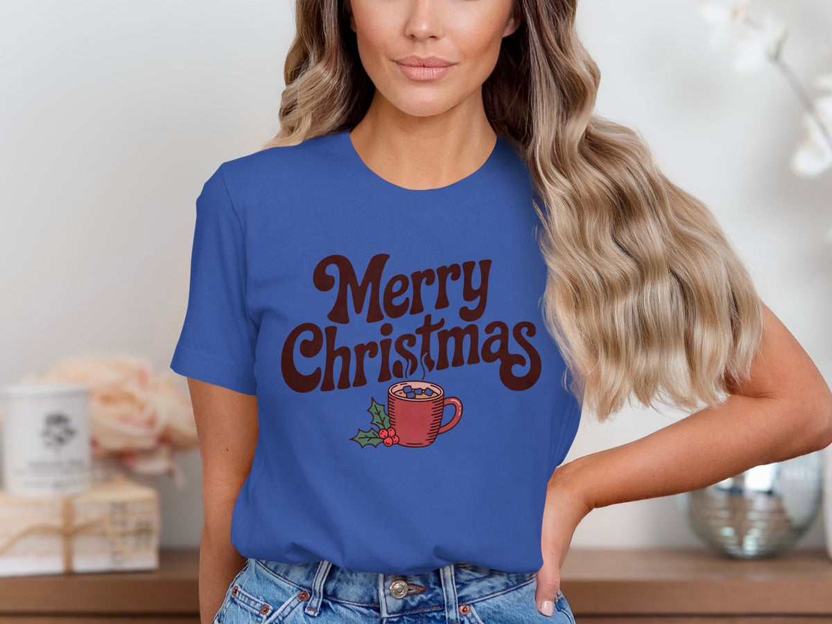 Blue t-shirt with brown text "Merry Christmas" and a cocoa mug graphic.