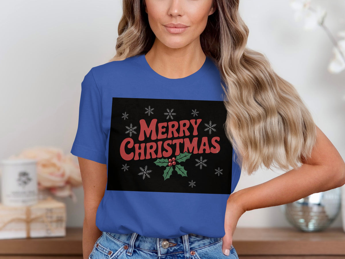Blue t-shirt with "Merry Christmas" text and holly graphic.