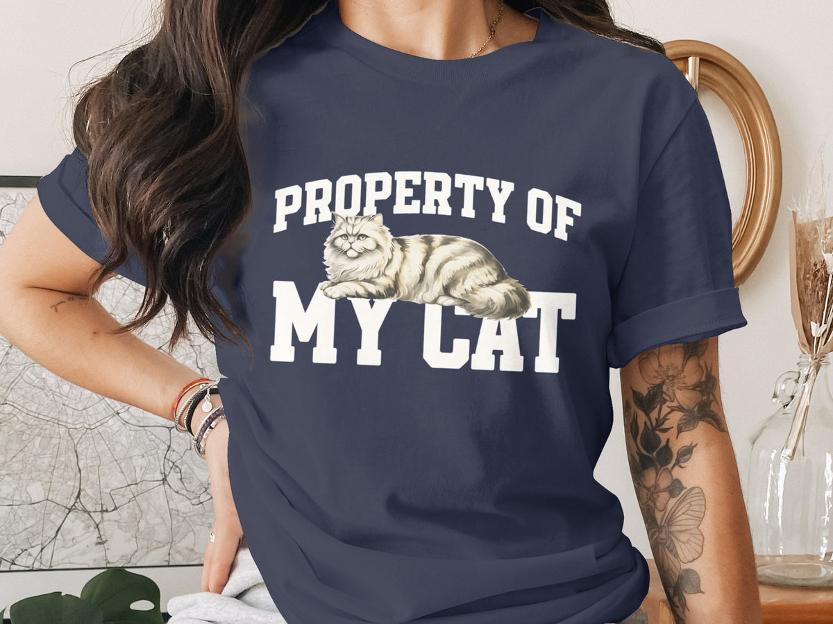 Navy t-shirt with white text "PROPERTY OF MY CAT" and a fluffy cat illustration.