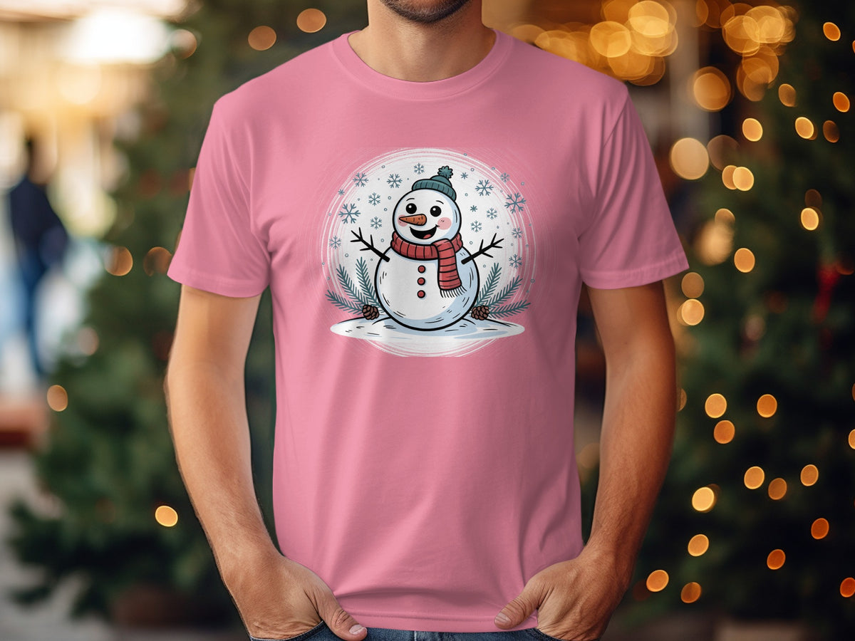 Pink t-shirt with a cartoon snowman wearing a hat and scarf.