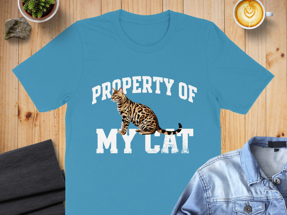 Blue t-shirt with "PROPERTY OF MY CAT" text and a Bengal cat graphic.