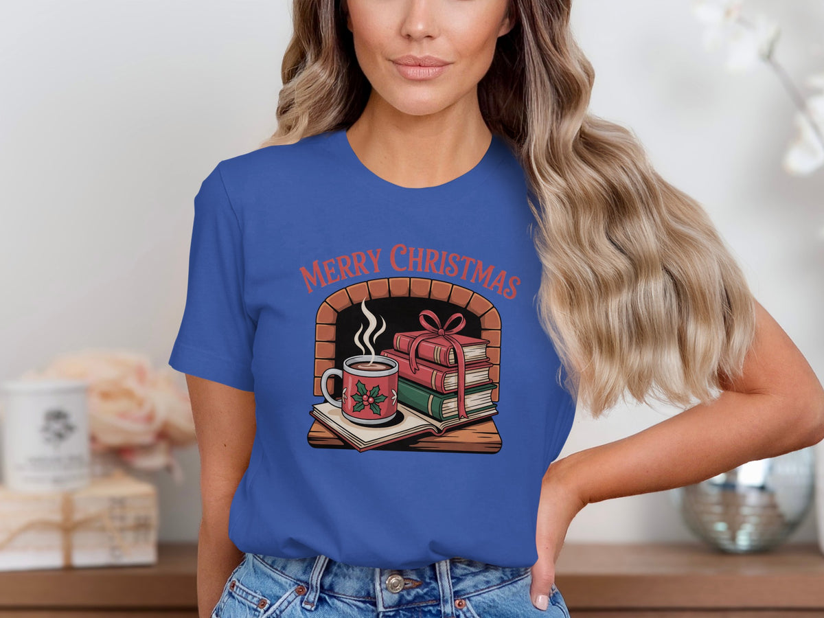 Merry Christmas design with fireplace, books, and hot cocoa on a blue t-shirt.
