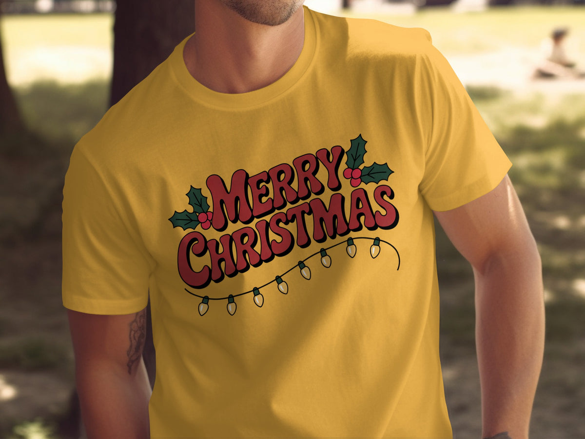 Yellow t-shirt with red "MERRY CHRISTMAS" text and string lights design.