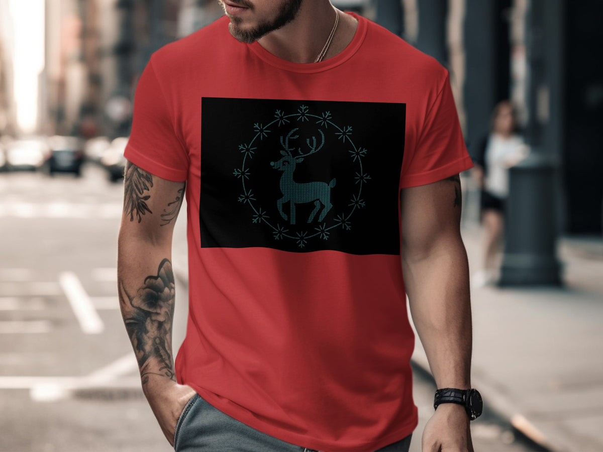 Red t-shirt with a dark rectangle featuring a teal reindeer and snowflake graphic.