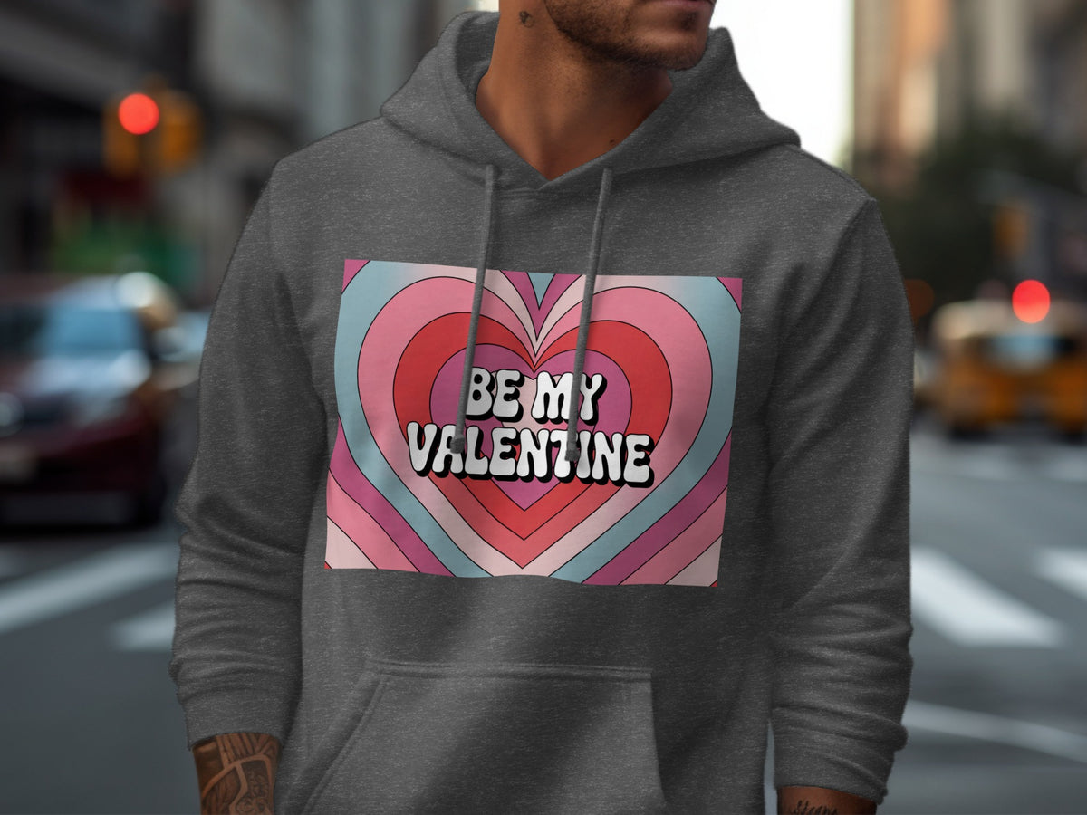 Dark grey hoodie with a heart design and text "BE MY VALENTINE."