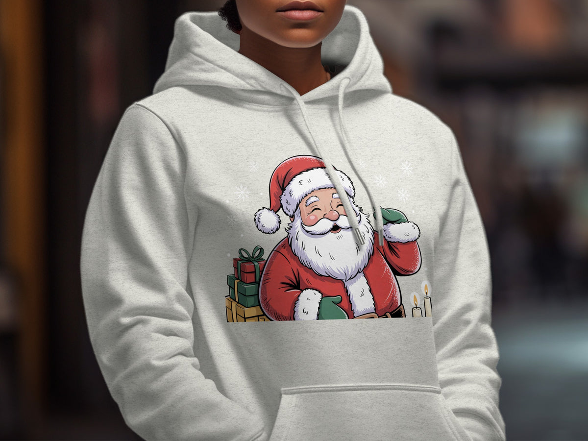 A person wearing a light gray hoodie featuring a cartoon Santa Claus with gifts and candles.