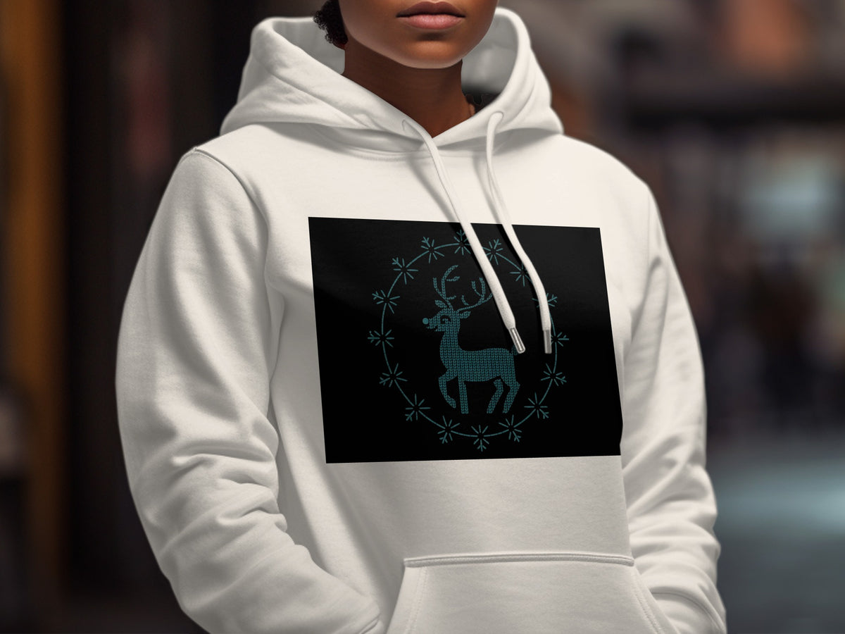 White hoodie featuring a black square with a teal pixelated deer inside a snowflake wreath.