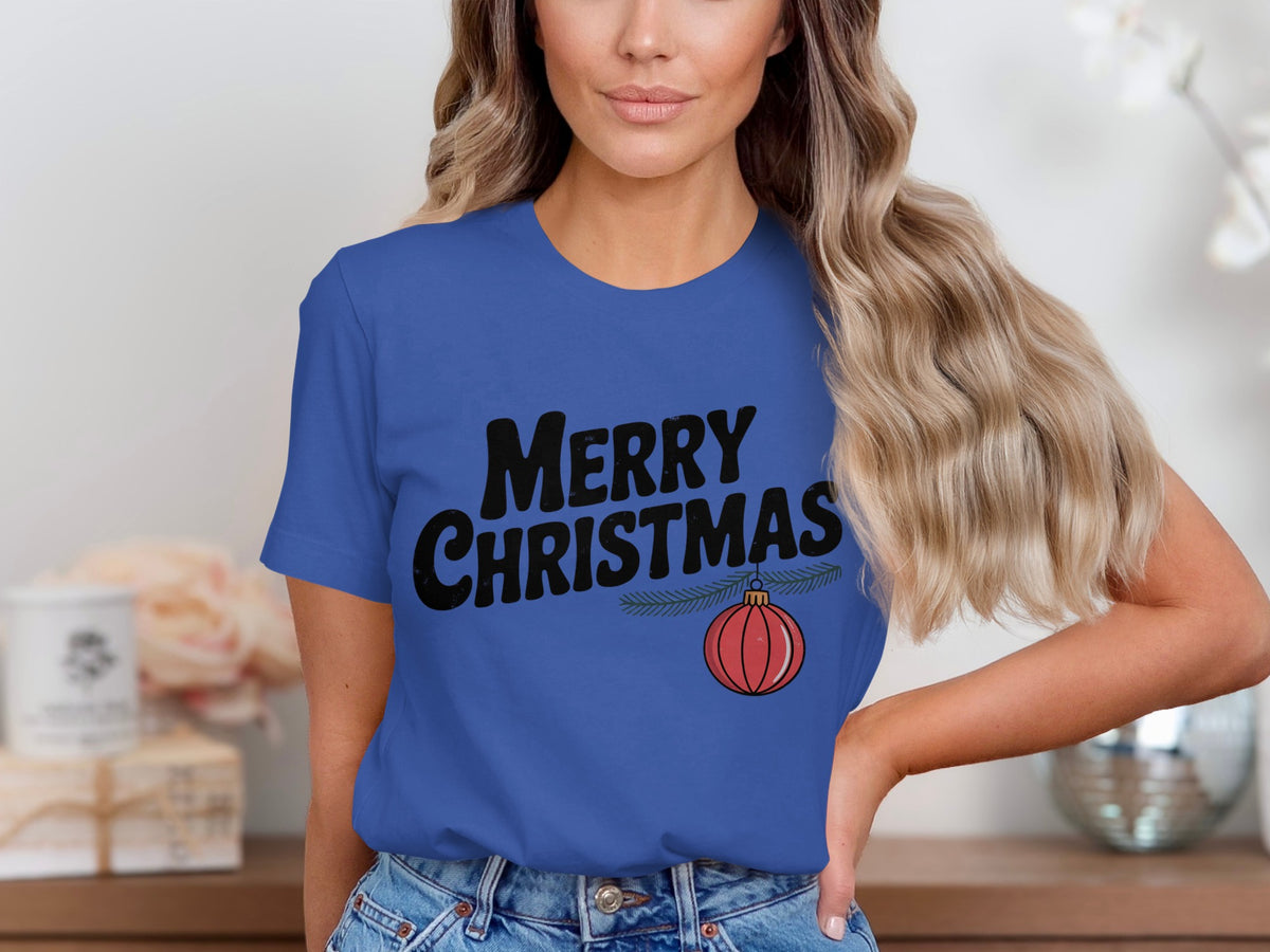 Blue t-shirt with "MERRY CHRISTMAS" text and a red ornament.