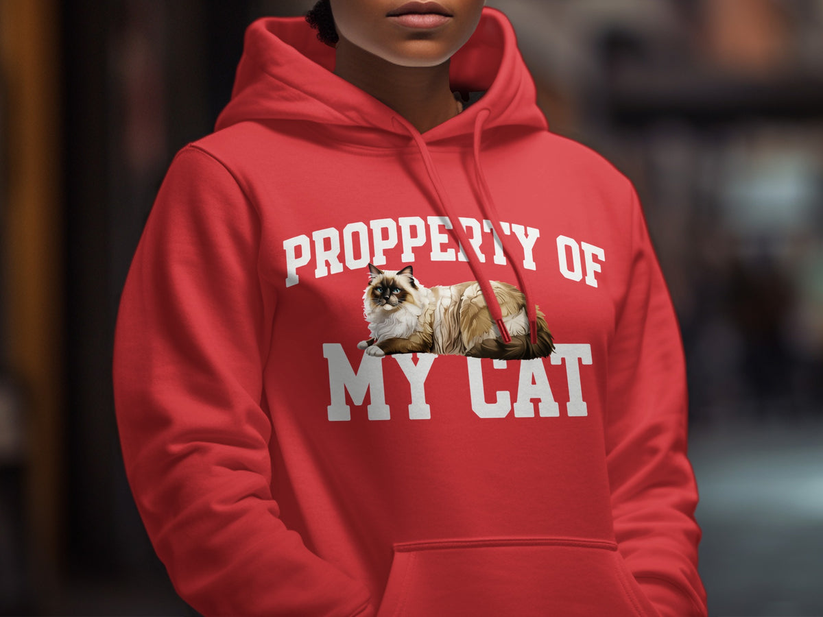 Red hoodie with "PROPERTY OF MY CAT" text and a ragdoll cat illustration.