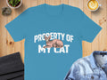 Blue t-shirt with "PROPERTY OF MY CAT" and a Sphinx cat graphic.