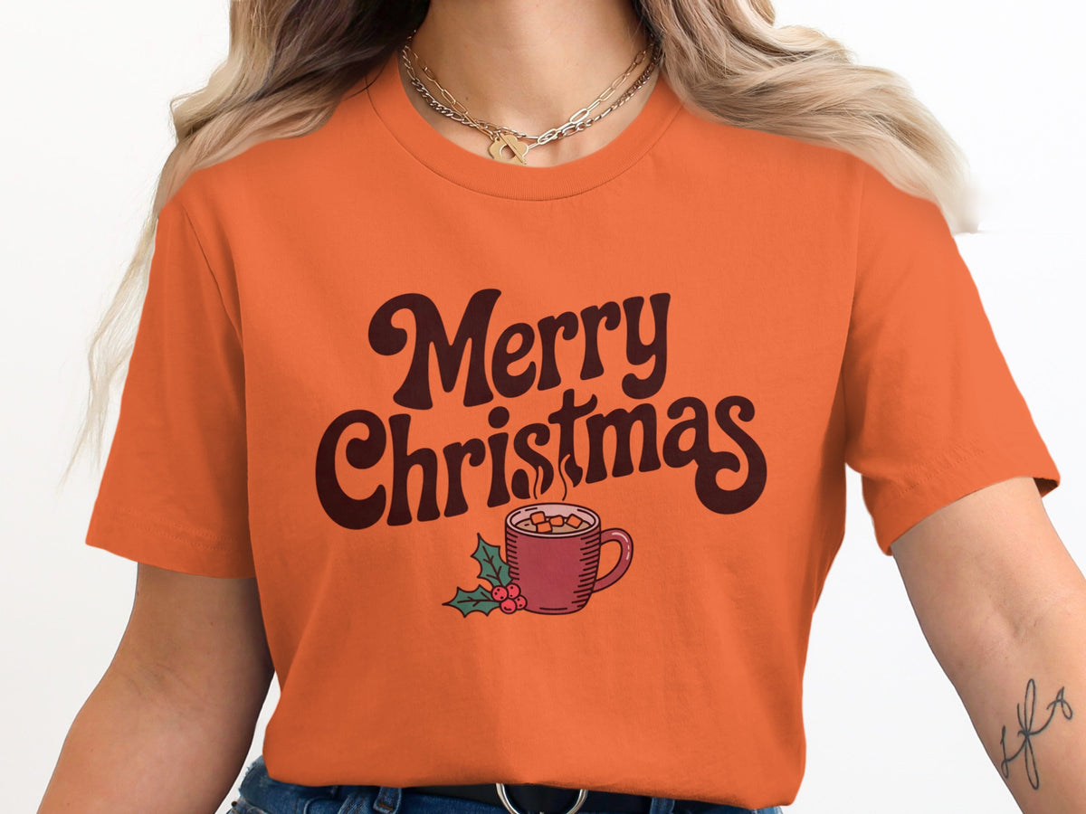 Orange t-shirt with "Merry Christmas" text and a mug of hot chocolate illustration.