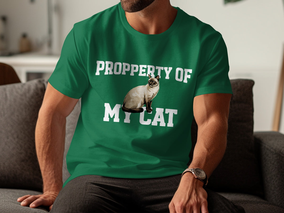 Green t-shirt with "Propety of My Cat" and a Siamese cat graphic.