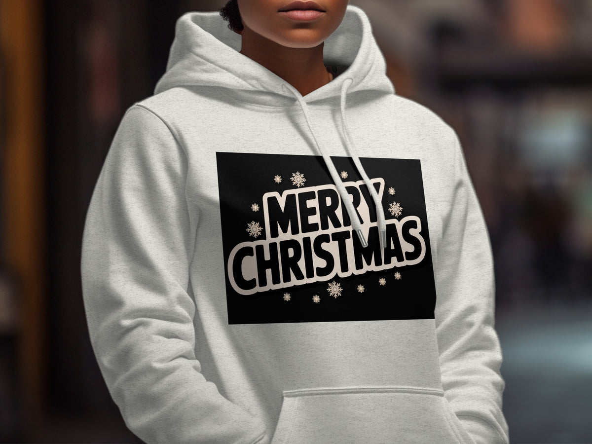Light gray hoodie on a person with "Merry Christmas" text and snowflakes.