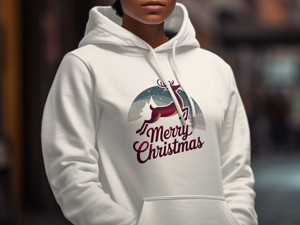 White hoodie with a Christmas graphic of a reindeer and snow, saying "Merry Christmas".