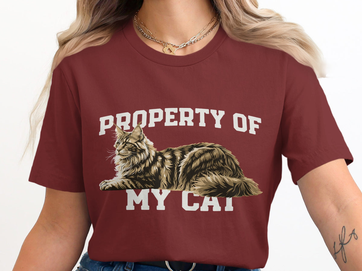 Maroon t-shirt with graphic text "PROPERTY OF MY CAT" and a Maine Coon cat.