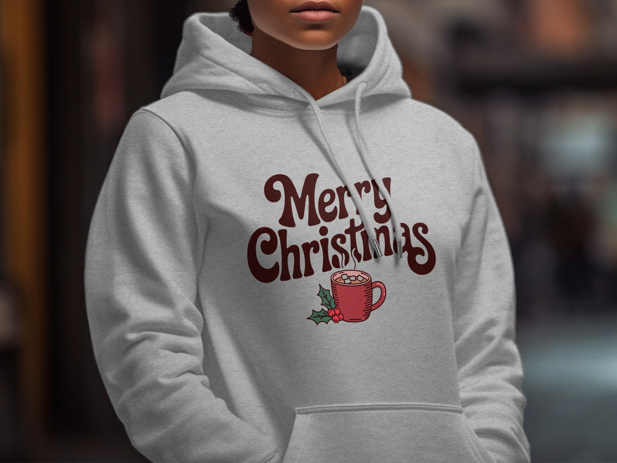 Grey hoodie with maroon "Merry Christmas" text and hot chocolate mug graphic.