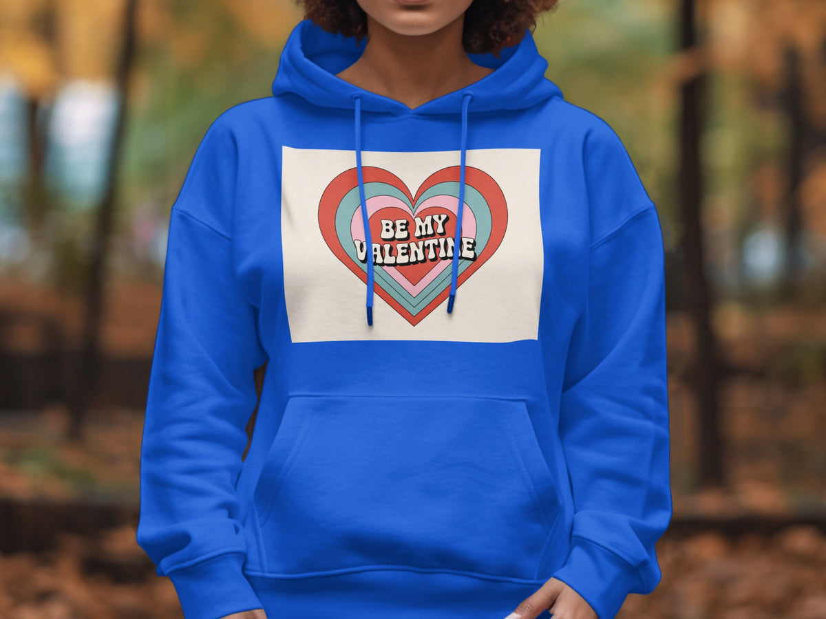 Royal blue hoodie with a layered heart graphic saying "BE MY VALENTINE".