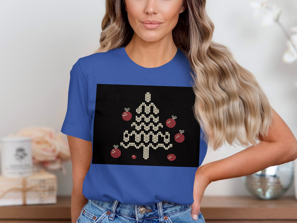 Blue t-shirt with a black rectangle featuring a pixelated Christmas tree with ornaments.